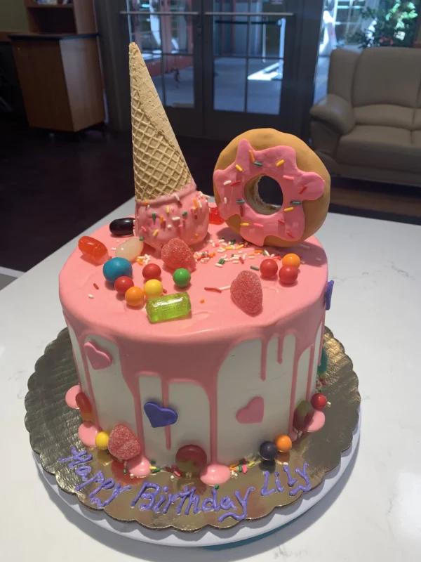 drip cake with donut and ice cream